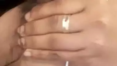 Horny Indian teen fingering pussy