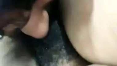 Tamil sex of a guy eating his stepmom’s hairy pussy