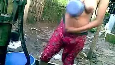 Sexy village girl having an open bath