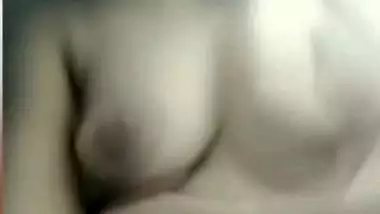 Chubby shy Indian girl showing round boobs to lover