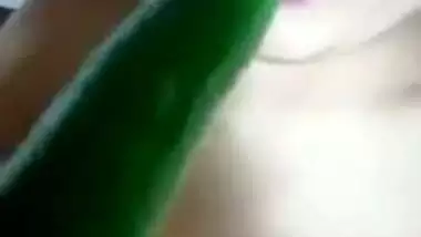 Hot SWEETHEART masturbating pussy with a cucumber