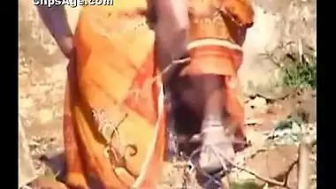 Indian desi Brick factory supervisor lady taking pee outside captured on video