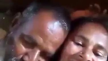 An old man enjoys the boob sucking of a desi lady