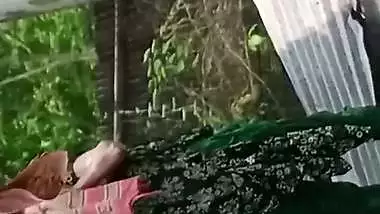 Village neighbor girl outdoor bath caught through hole