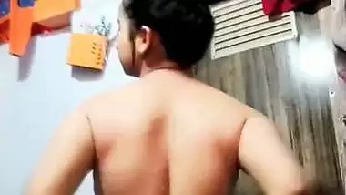 An 18-year-old sexy teen squeezes her big boobs and ass